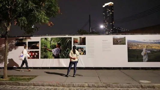 Christina Santucci. The Far-reaching Fallout from COVID-19 exhibition at Brooklyn Bridge Park features work from Fluxus Foto Collective, Ziyah Gafić, Nyimas Laula, Dina Litovsky, Cynthia Matonhodze, Nadège Mazars, Dhiraj Singh, and Nichole Sobecki.