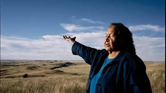 Maggie Steber. Steber's Lakota Sioux Elder and Spiritual Leader Marie Randall prays over ancestral lands on Pine Ridge Lakota Sioux Reservation, South Dakota US was made in 2004.